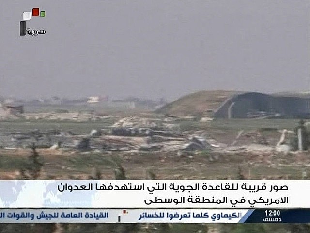 Imagem feita por uma rede televisiva síria mostra a base atingida pelo ataque americano | SYRIAN TV via Reuters